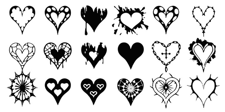 Collection of black and white broken heart silhouettes on black background