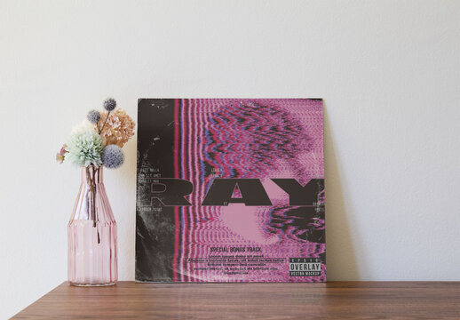 Vinyl cover Jacket With Flowers on Wooden Table. PSD template mockup.