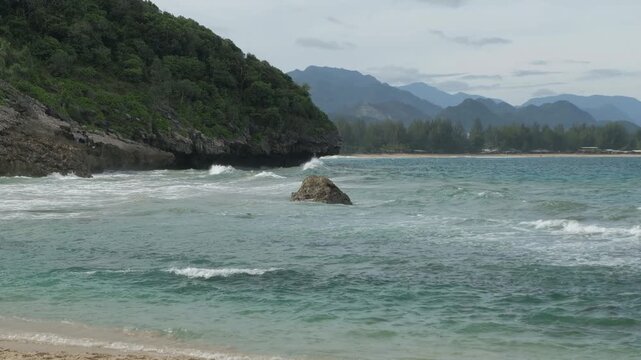 Low Angle Shot of Gentle Ocean Waves Crushing on Tropical Beach Shore