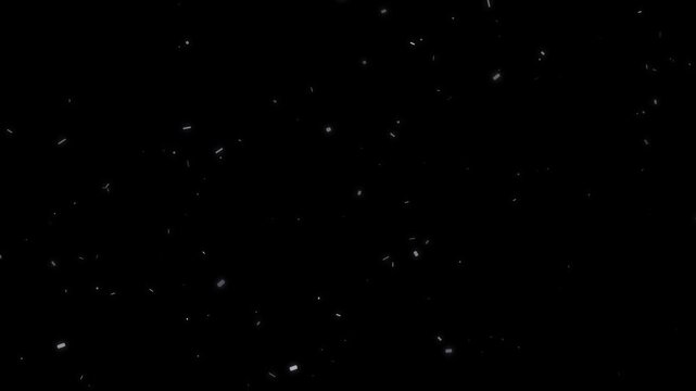 Subtle white dust particles flowing slowly upwards in a dark atmospheric abstract video footage