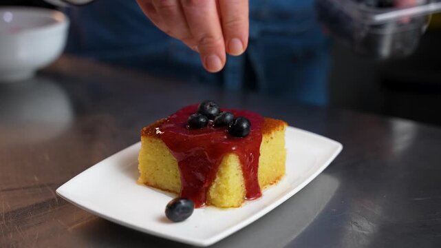 Traditional Turkish Revani Dessert with Plum Sauce and Blueberries