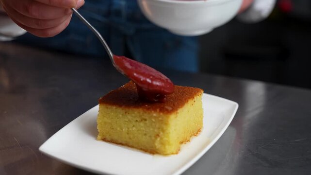 Traditional Turkish Revani Dessert with Plum Sauce