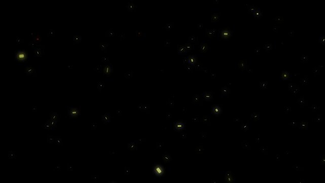 Ethereal golden dust particles gently float and rise against a deep black background motion