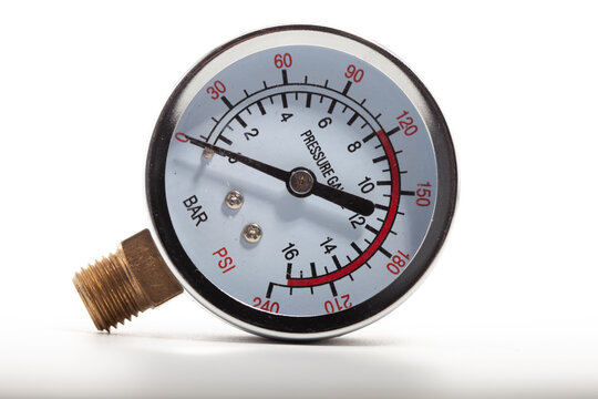 Close-up of a professional black analog pressure gauge with white dial displaying measurements in kg/cm&sup2;, kPa (BAR), and PSI (Lb/in&sup2;). The needle points to approximately 9 kg/cm&sup2;. Essential industrial