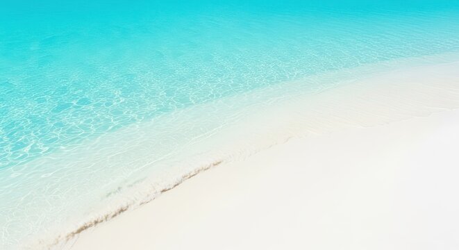 Bright sunny day view of incredibly clear turquoise water lapping gently onto pristine white sandy beach during a relaxing tropical vacation, vacation, water, scenic