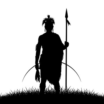 Silhouette of an African Tribal Warrior Holding a Spear Standing in a Field