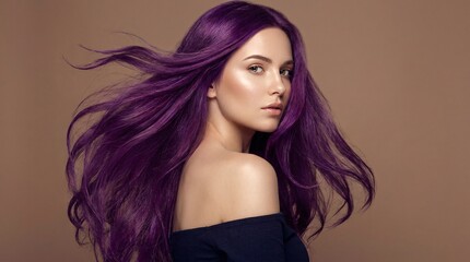 Naklejka premium Exquisite fashion portrait highlights a gorgeous young woman with flawless glowing skin and incredibly long violet hair blowing in the wind.