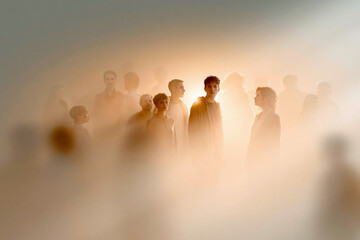 Fototapeta premium a group of people wandering in the fog
