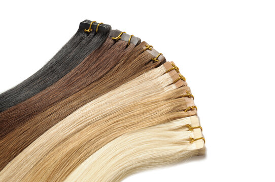 closerup of various colors of straight tape in human hair extensions