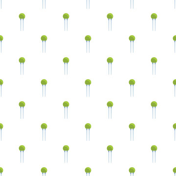 Green ceramic capacitors forming a repetitive pattern, representing electronic components and technology