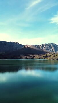 wide angle aerial view of mount barujari volcano and segara anak lake lombok