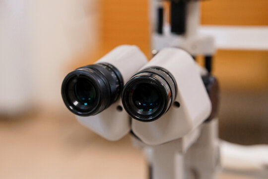 Close-up view of ophthalmology autorefractor lenses device for eye examination in clinic