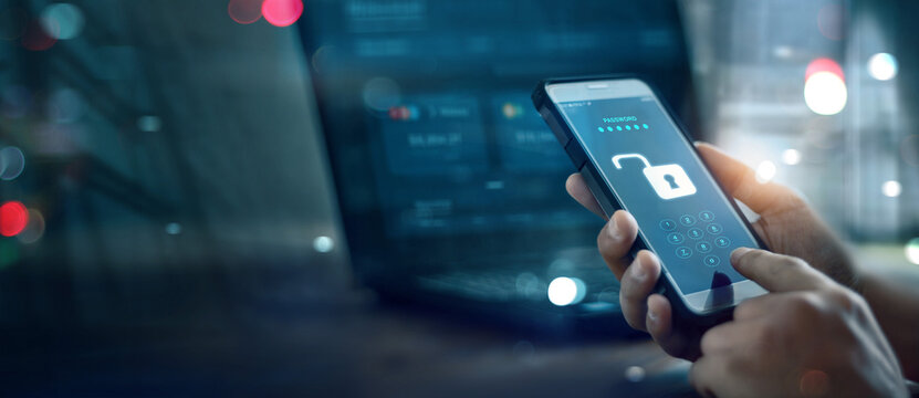 A male scammer used a mobile phone to unlock the security code of victims' bank accounts. Scammer and Phishing, Cyber scam of smartphone. with login pass code. Online security threat and fraud