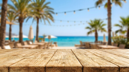 Fototapeta premium Empty wooden table with blurred tropical beach resort background for product display in summer vacation restaurant cafe.