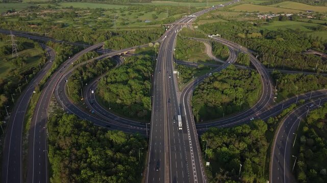 Complex Motorway Intersection With Moving Vehicles by Daylight