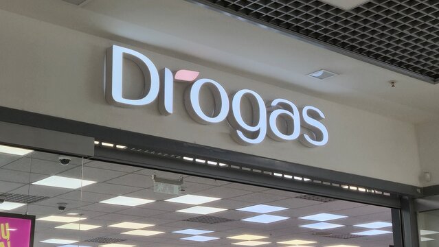 Vilnius Lithuania 02.04.2026 Drogas cosmetics store entrance in shopping mall with illuminated logo beauty products retail interior and modern commercial design concept