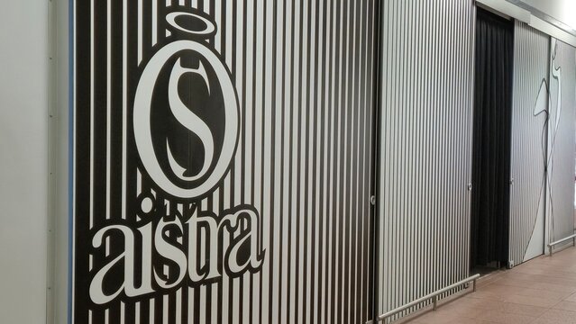 Vilnius Lithuania 02.04.2026 Aistra intimate boutique facade with striped monochrome wall design and private entrance inside modern shopping mall retail interior concept