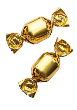 Two wrapped golden foil chocolates on white