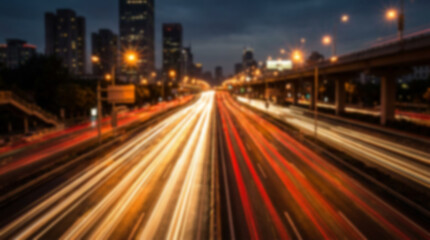 Obraz premium City highway at night with light trails from cars, motion blur effect, urban landscape