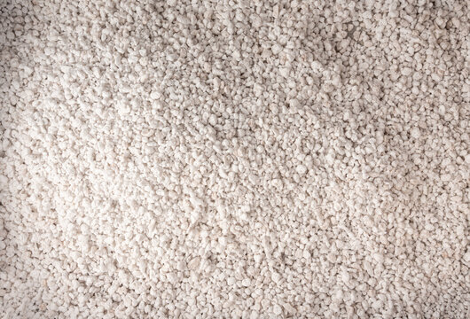Perlite textured background, crushed amorphous volcanic glass close up