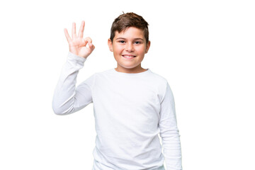 Fototapeta premium Little caucasian kid over isolated chroma key background showing ok sign with fingers