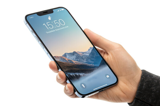 Hand holding iphone 16 pro with mountain landscape on screen on white isolated on a transparent background