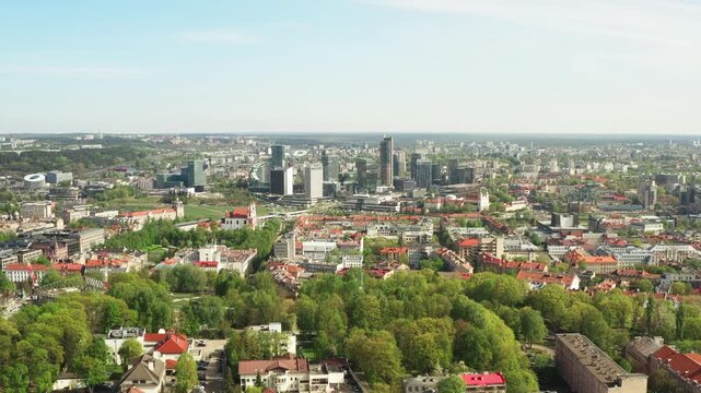Glass skyscrapers of Vilnius modern business district in Lithuania. Contemporary office buildings and financial center architecture at sunny day. European city center with modern development.