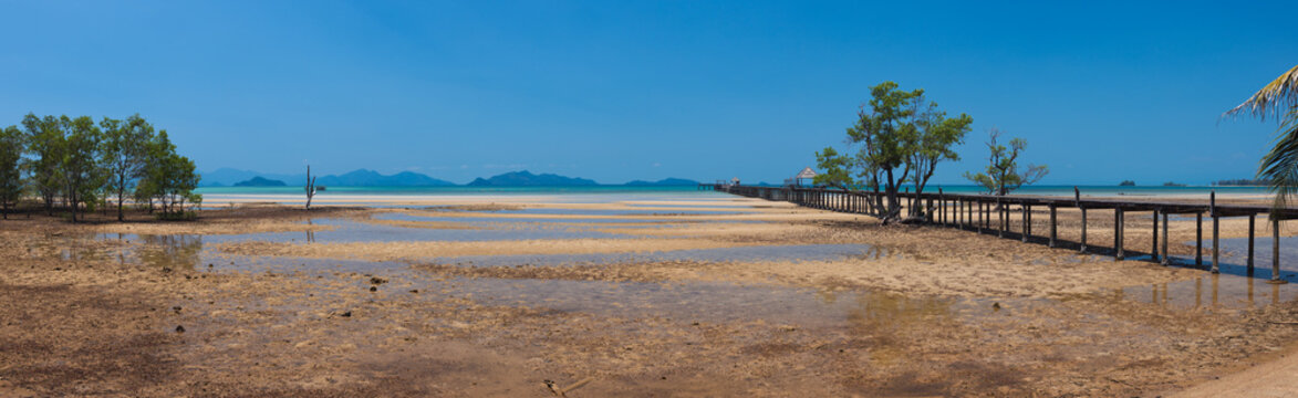 Panorama landscape background of wooden bridge with sea beach and blue sky at day in Koh Mak, Trat, Thailand Summer travel vacation concept