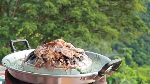 Moo Kra Ta or Thai BBQ buffet food.