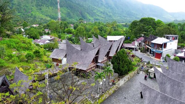 Aerial view of traditional Batak houses village near Lake Toba in Samosir Indonesia