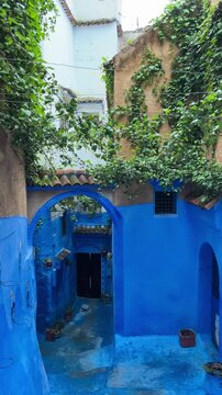 Street With Blue Painted Buildings