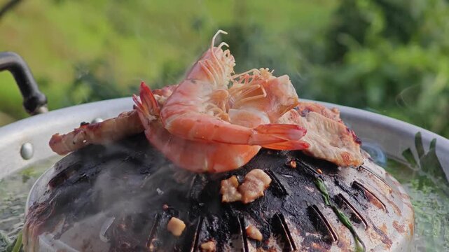 Moo Kra Ta or Thai BBQ buffet food.