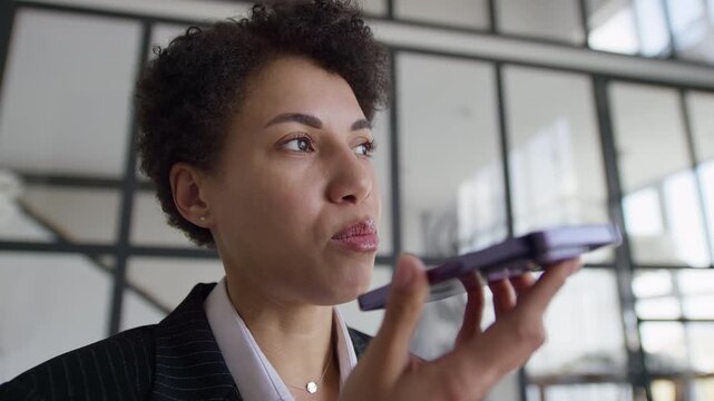 Businesswoman Recording Smartphone Voice Message
