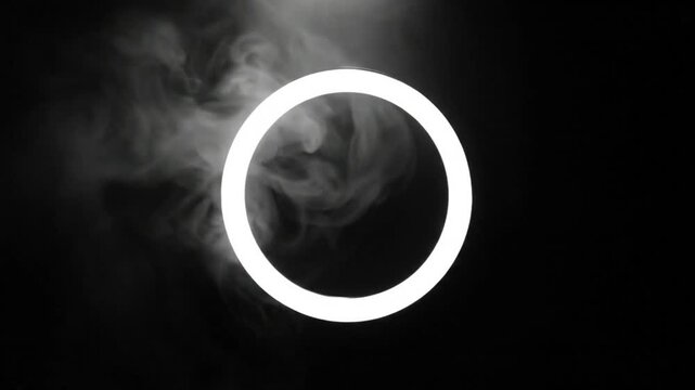 Abstract Smoke and Illuminated Circle Creates a Moody, Ethereal Atmosphere Against a Black Background