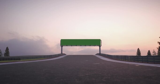 Race cars drive toward a billboard on a racing track at sunset, wide angle view with asphalt, horizon, clouds and forest landscape