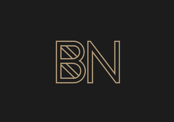 Modern minimalist gold BN initials logo design on dark background © alpen