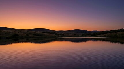 Obraz premium Serene Sunset Over Calm Lake In Countryside Landscape