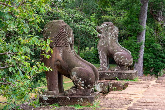  Stone guardian lions (Singha) at East Mebon temple, Angkor, Cambodia.