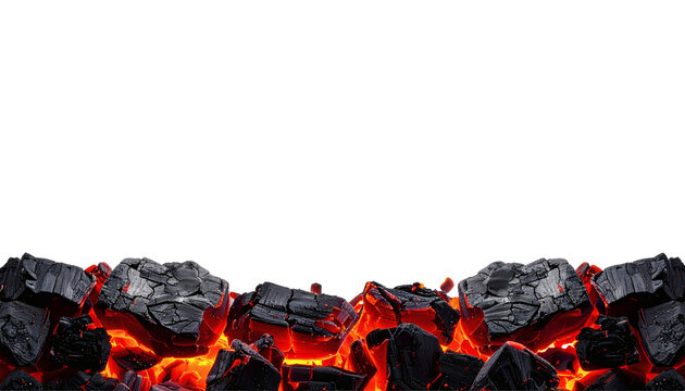 A row of glowing red hot burning charcoal briquettes piled together creating intense heat and vibrant orange embers&nbsp;