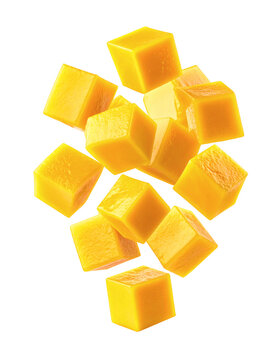 A vibrant collection of freshly cut ripe mango cubes suspended dynamically in midair creating a tropical fruit concept&nbsp;