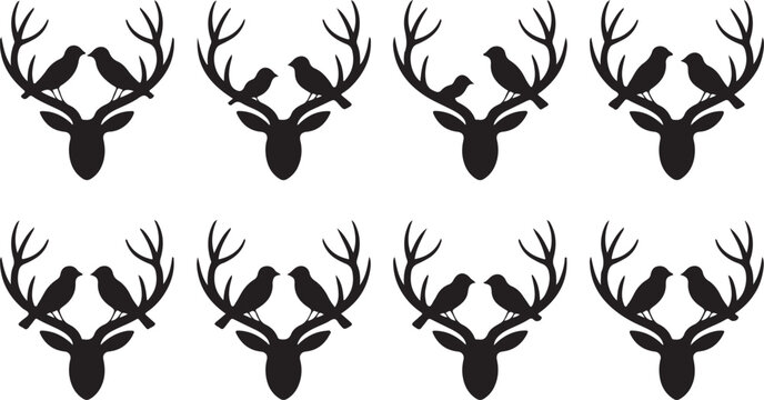 Black silhouettes of deer heads with birds on antlers repeating pattern