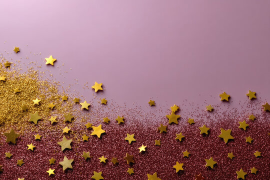 Gold star confetti glitter pink background festive celebration sparkle party joyful decorative scattered