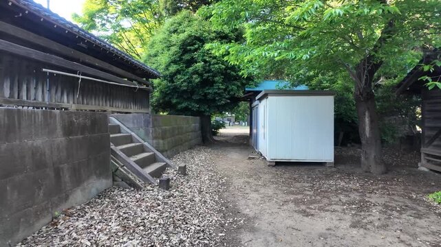 Smooth POV Walking Shot Revealing the Main Hall of a Traditional Japanese Shrine