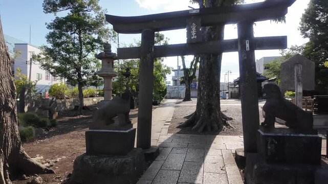 Smooth POV Walking Shot Entering Atago Shrine and Approaching a Small Wooden Sub-Shrine in Japan