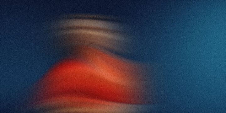 Blurred human figure in orange shirt moving fast against a blue background motion blur effect grainy texture.