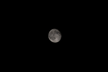Minimal full moon isolated in dark night sky © Vjekoslav
