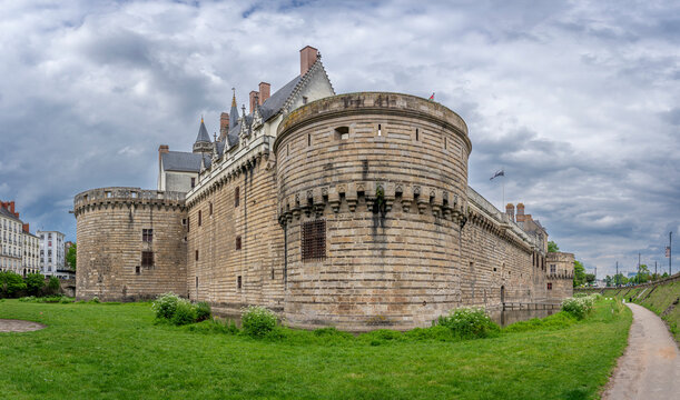 Nantes, France - 05 07 2026: Castle of the Dukes of Brittany. Panoramic view of the fortified castle with dungeons and moats
