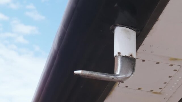 Close Up of Pitot Tube Under Wing of small general aviation airplane. Ground Level View of Critical Aviation Safety Instrument Before Flight