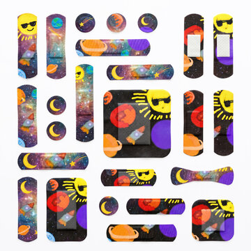 Galaxy Themed Children Adhesive Bandages Isolated on White Background
