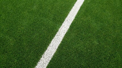 Obraz premium Precision white boundary line on green synthetic turf for professional sports stadium maintenance and athletic field design.